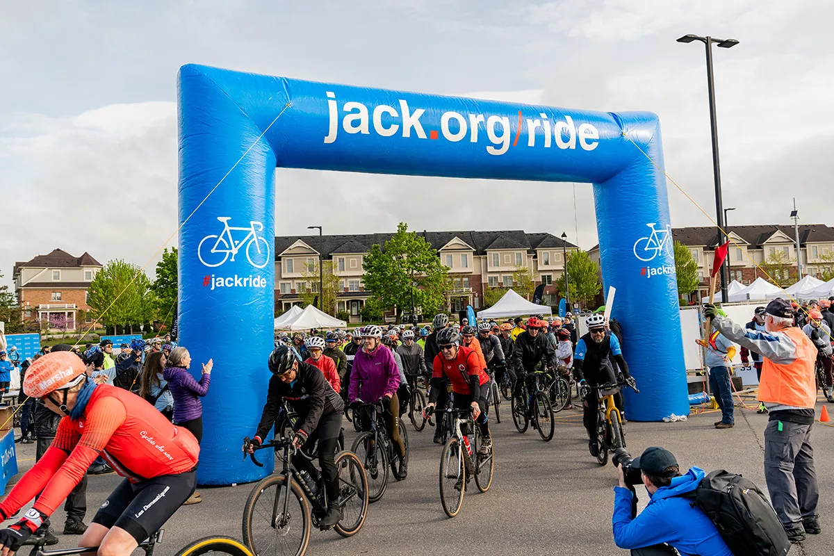 Cyclists riding in the Jack Ride bikeathon charity cycling event through the hills of Caledon, Ontario supporting youth mental health.