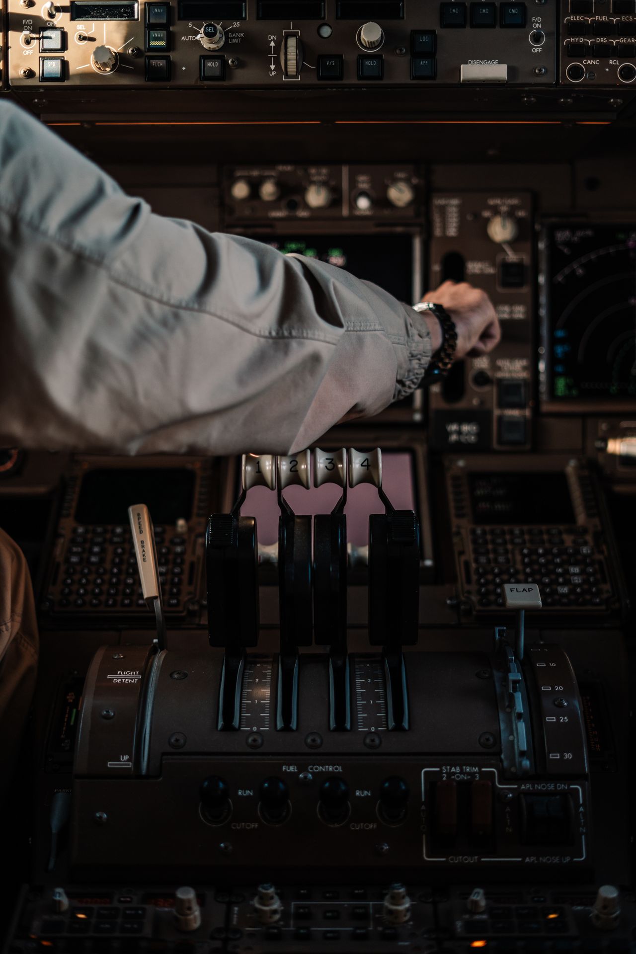 Visitor explores an aircraft cockpit during Open Cockpit Day at Alberta Aviation Museum, a family-friendly Edmonton event.